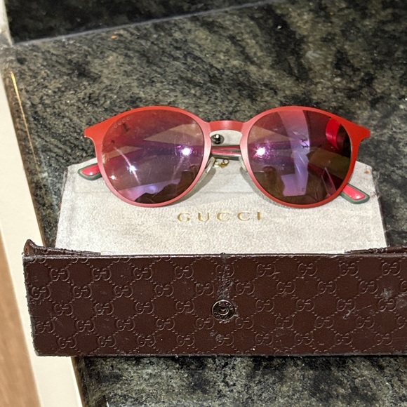 Gucci Accessories - Gucci Red Sunglasses - light scratches and they do not affect visibility